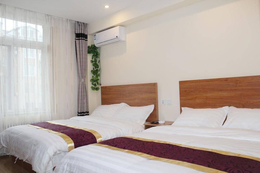 Dalian Kai Bin Business Inn ต้าเหลียน ภายนอก รูปภาพ